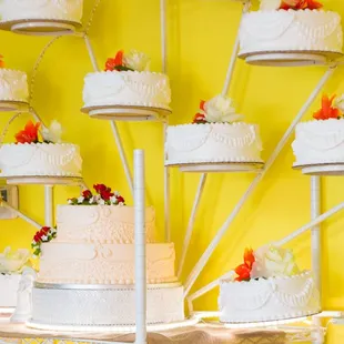 a display of wedding cakes