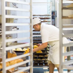 a baker working in a bakery
