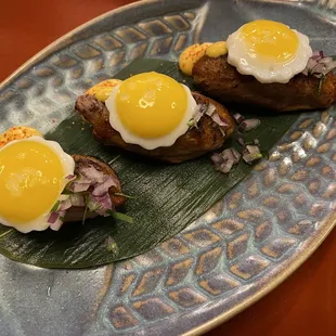 Wagyu nigiri. Quail eggs. Delicate, but delicious.