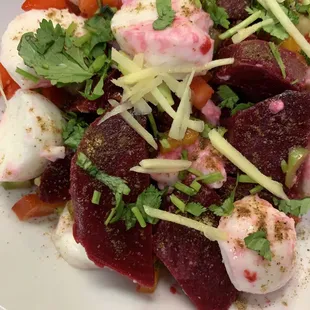 BEETS SALAD: Beets and Mozzarella Chesse  and Ginger sprinkled with light seasoning.