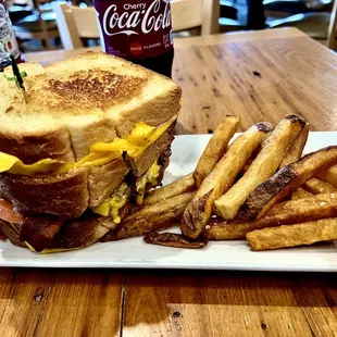 Heart Attack Burger.  Two grilled cheese sandwiches with a hamburger in the middle!