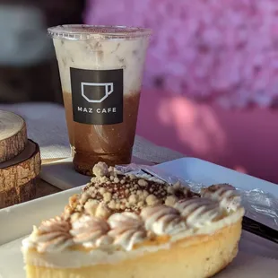 a cup of coffee and a pastry