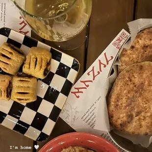 Home sweet home at Mazal! Vegan Bourekas, Sweet Potato Hummus, glass of the Alberiño