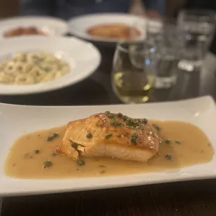 Salmón piccata. The most delicious and succulent piece of salmon I've ever had.