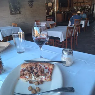 1/3 of my Slice, bit of my wine[house red], was left. So good forget to take starting photo. Duh. Filled with your choice of topping(s).