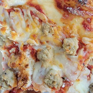 Chunk of bread on top of pizza