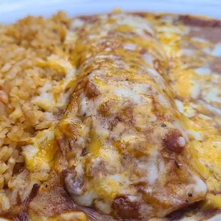 Small enchilada, add rice &amp; beans.