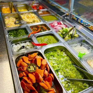 a variety of salads and condiments