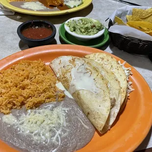 Lunch combo with chicken quesadilla and ground beef chalupa.