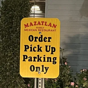 order pick up parking only sign