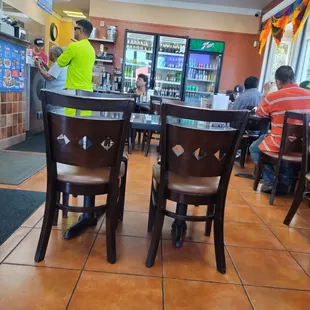 Restroom in the back to the left. Plenty of customers in line to order food