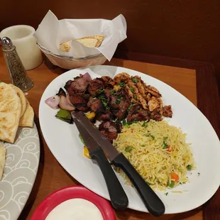 Lamb kabobs, chicken Sharma, rice &amp; piita. (We think we like gyro better than the sharwma) 1-7-23
