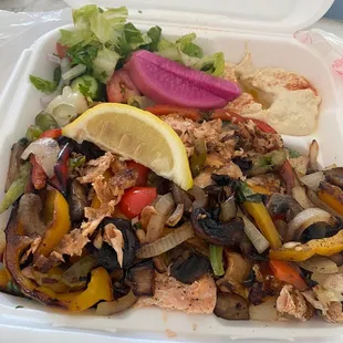 Salmon platter so good, I got it with extra grilled veggies! This place is a hidden gem in La Mirada!