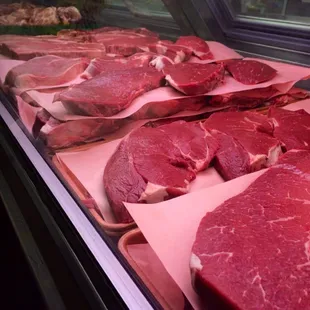 a display of raw meat