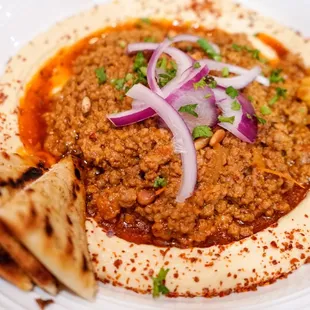 Spiced lamb with hummus