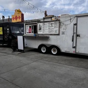 a food truck parked in a parking lot