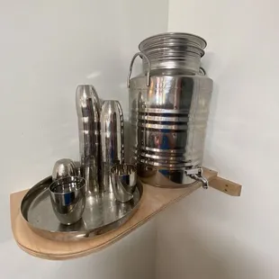 Water, with reusable cups.