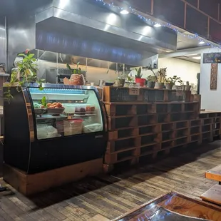 The kitchen area with take-out pick up on the right.