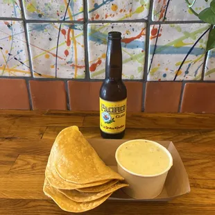 Chips and Queso with a Pacifico