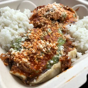 a meal in a styrofoam container