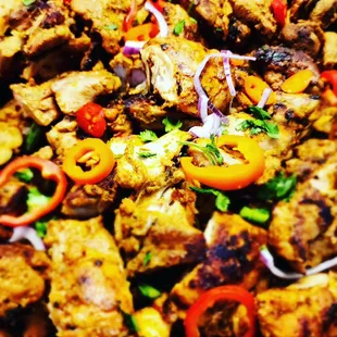 a plate of chicken and vegetables