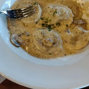 Wild Mushroom Ravioli (5 pieces, fork for size reference)