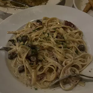 I can't remember the name but this was one of the specials...mushrooms prosciutto Alfredo sauce magic