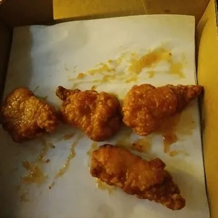 Sorry what is this supposed to be 5 boneless wings?  Need corps number this is sad and was over paid to be delievered