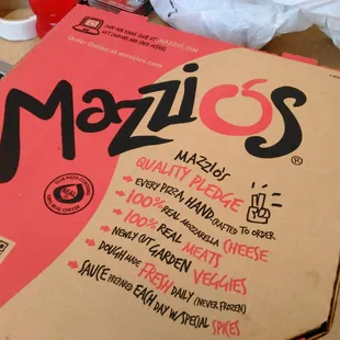 a pizza box on a table
