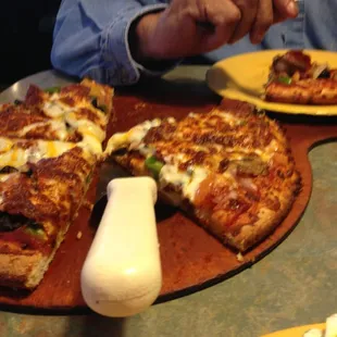 a man eating a slice of pizza