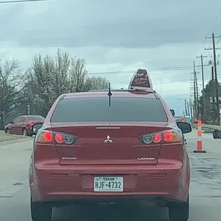 This Mazzio's delivery driver is driving like a maniac and almost wrecked into my car. Get better drivers.