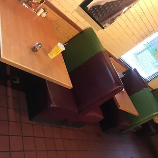 a table and chairs in a restaurant