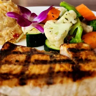 Swordfish  Blackened Harpooned Swordfish. Served with cheese mash potatoes, vegetables