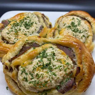 "Roast Beef N Cheddar" Roast beef &amp; cheddar baked in  fresh bread.  Topped w/horseradish mayo and chives