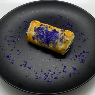 "Ube Strudel" Puff pastry filled w/homemade ube halaya &amp; cream cheese filling.  Sprinkled w/casting sugar