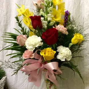 Made for a lady retiring from Hobby Lobby after 32 years. I was asked to come up with something elegant, beautiful for the occasion.