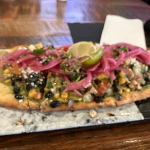 Lupe&apos;s Avocado Chicken Flat Bread.