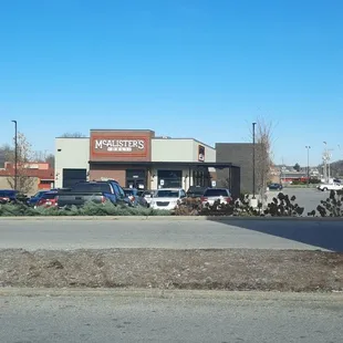 a parking lot with cars parked in it