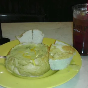Bread bowl with soup and a order of sweet tea