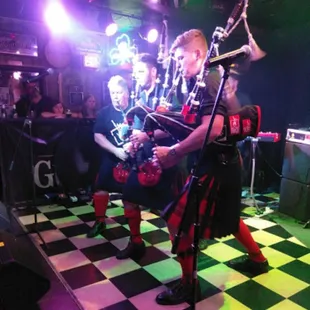 a man playing the bagpipe
