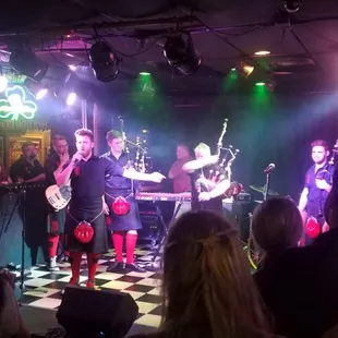 a band performing on stage