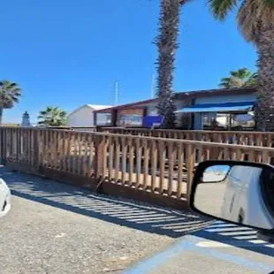 a view of the beach from a car window