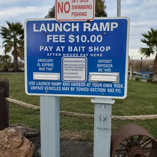 Signage, left side of ramp