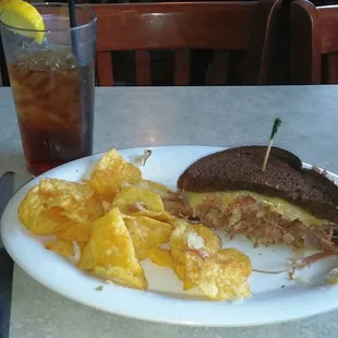 Reuben with half sandwich consumed