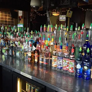 Our large selection of liquor, Happy Hour M-F 11-7p
