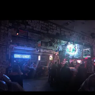 a crowd of people at a bar