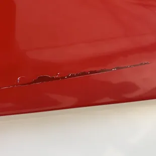 Before photo shows previous repair with wrong color gelcoat.