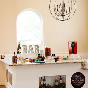 a bar with bottles of liquor