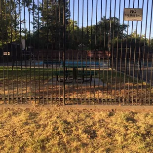 Deep pool with diving board n background