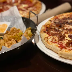 Calamari, pepperoni and Sausage pizzas
